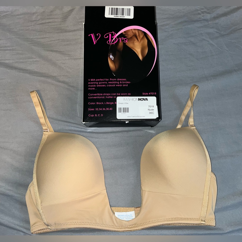 This deep V mid back bra. Suggest someone with maybe 32-34 B. To small for 36C